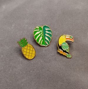 Golden enamel brooches